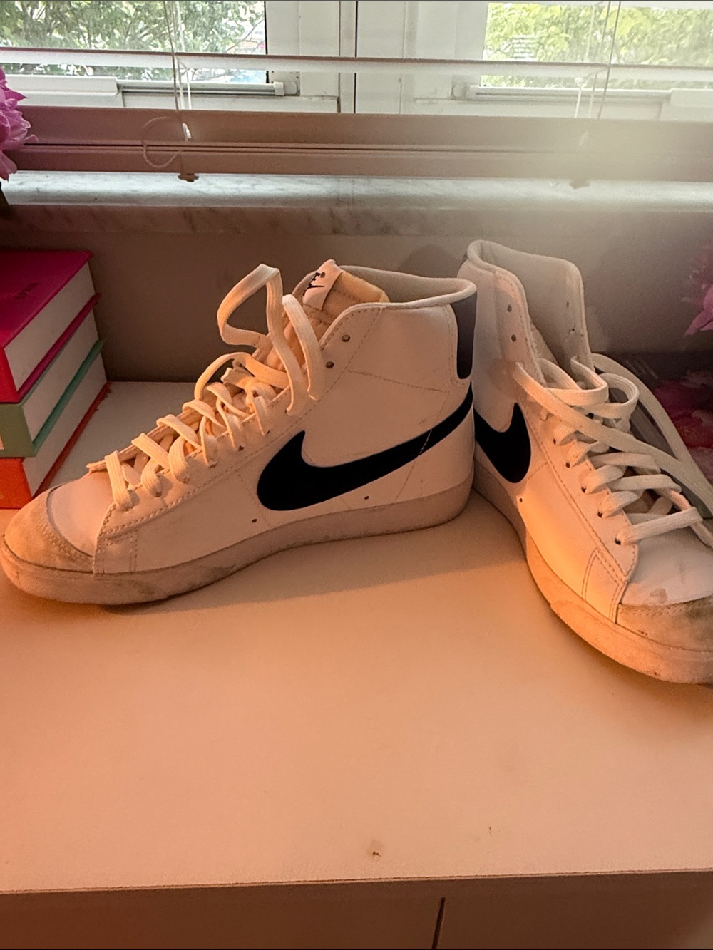 Nike White High-Top Sneakers with Black Swoosh Accent